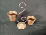 three cups sitting next to each other on a table