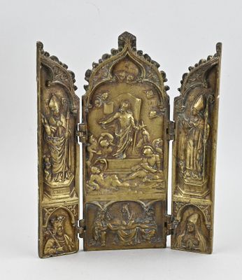 an image of a gold plated screen with a group of people