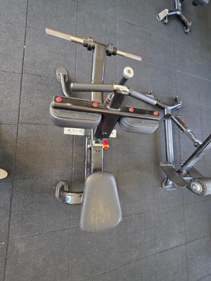 overhead view of a gym equipment set up on a tiled floor