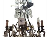 a chandelier that has a lot of glass hanging from it