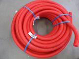a close up of a red hose on a table