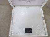 a white box with a black square in it