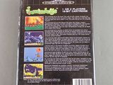 the back cover of a video game case with a picture of a dinosaur