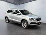 the new skc suv is parked in a large white room