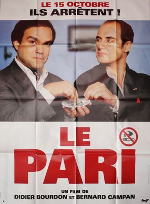 french movie poster for the film le pari, starring two men in suits