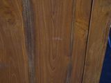 a close up of a wooden door with a handle on it