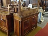 two wooden cabinets in a room with a red carpet