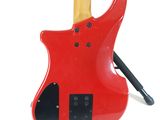 an image of a red electric guitar on a white background