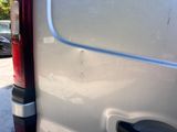 a close up of a car door handle with a sticker on it
