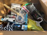 a cardboard box with various items inside of it