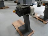 a machine that is sitting on a pallet in a warehouse