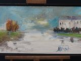 a painting on a easel with a painting of a river
