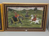 two framed paintings of men riding on horses in a field