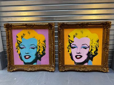 deux tableaux encadrés représentant Marilyn Monroe, dans des cadres dorés