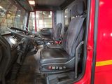 many seats in the back of a fire truck