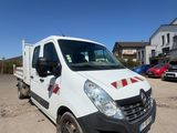 a white van that is parked in a parking lot