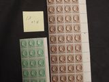 two stamps and a note on a black background