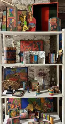 a white shelf with many different items on it