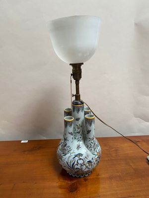 a lamp that is sitting on a wooden table