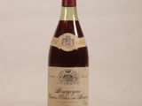 a bottle of wine that is sitting on a table