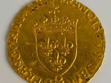 an image of a gold coin with a crown on top of it