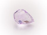 a close up of a purple diamond on a white background