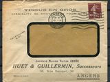 an old envelope with a stamp on it sitting on a table