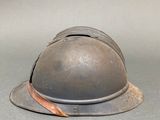 a helmet that is sitting on the ground