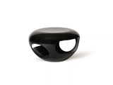 a black object on a white surface with a white background