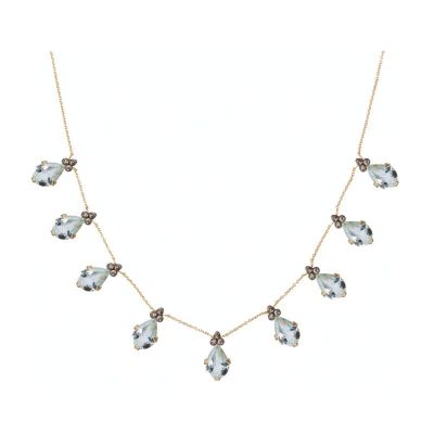 un collier en or orné de cristaux bleus et blancs montés sur une chaîne