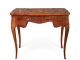 a wooden desk with a marble top and legs