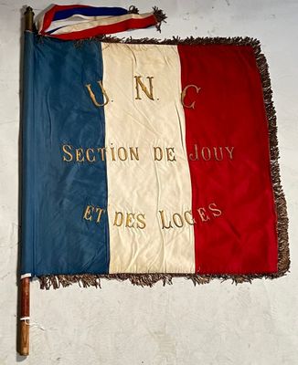 a flag that is hanging on the wall