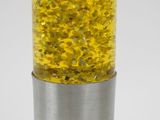 a yellow light that is on top of a silver pole