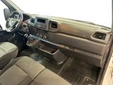 a picture of the inside of a car with a steering wheel