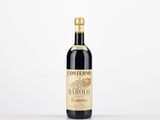 a bottle of red wine sitting on top of a table