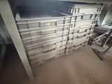 a lot of shelves that are in a room