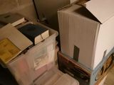 a stack of boxes sitting on top of each other in a room