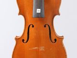 an old violin with a bow on a white background