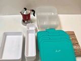 a table with a variety of containers on it