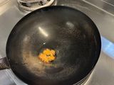 a frying pan on the stove with a frying pan on the burner