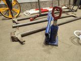 a lot of tools that are sitting on the floor