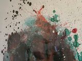 a picture of a painting of a man with paint splatters on it