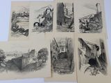 Plusieurs dessins représentant un château et un pont sont posés sur une table