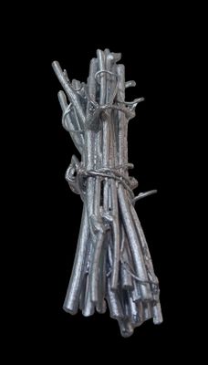 a bunch of silver sticks tied to a black background