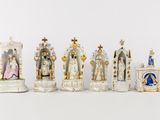 seven figurines of different sizes and colors