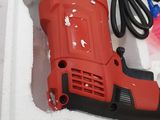 an image of a drill and other tools in a box
