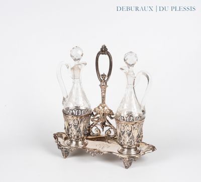 an image of a silver plate with three glass decanters on it