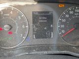 a close up of a car dashboard with a speedometer