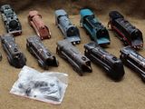 a lot of toy cars that are sitting on the floor
