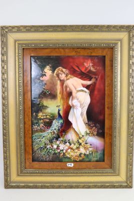 painting of a woman in a garden with flowers in a gold frame